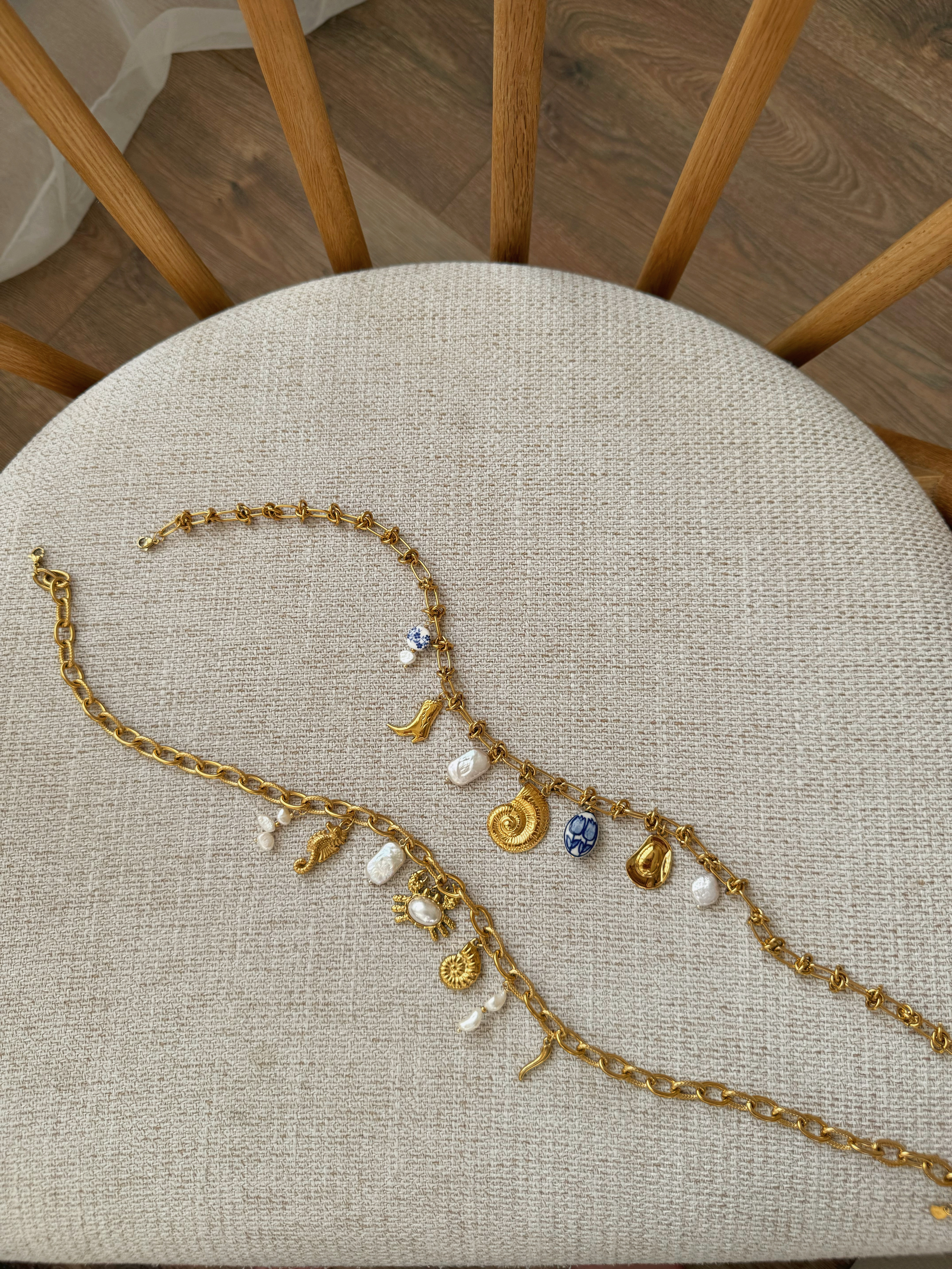 Shell charm ყელსაბამი
